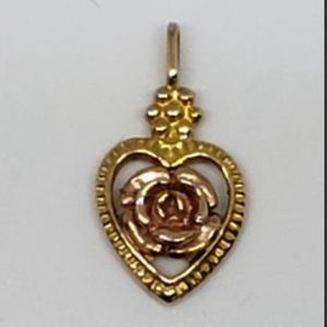Rose gold 10 k ( tests 11.4) pendant